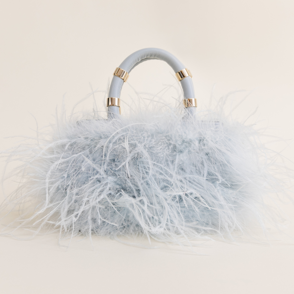 Blue feather bag sales