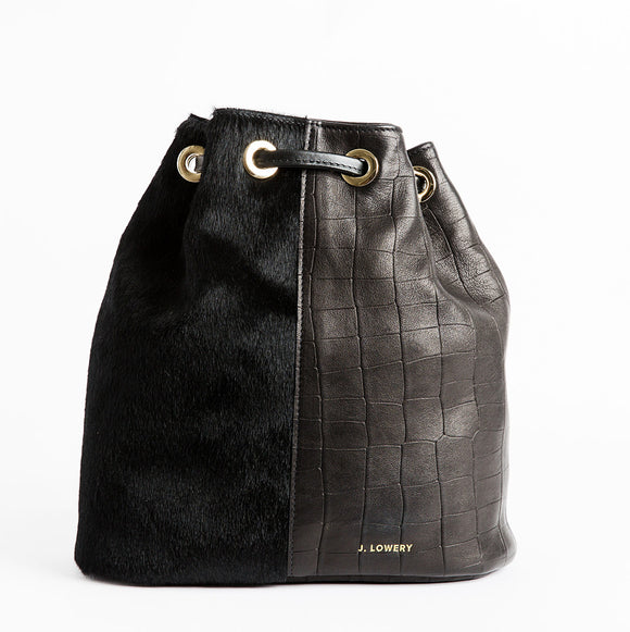 calf hair and black leather backpack