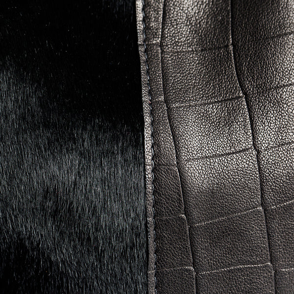 close-up calf hair and black leather